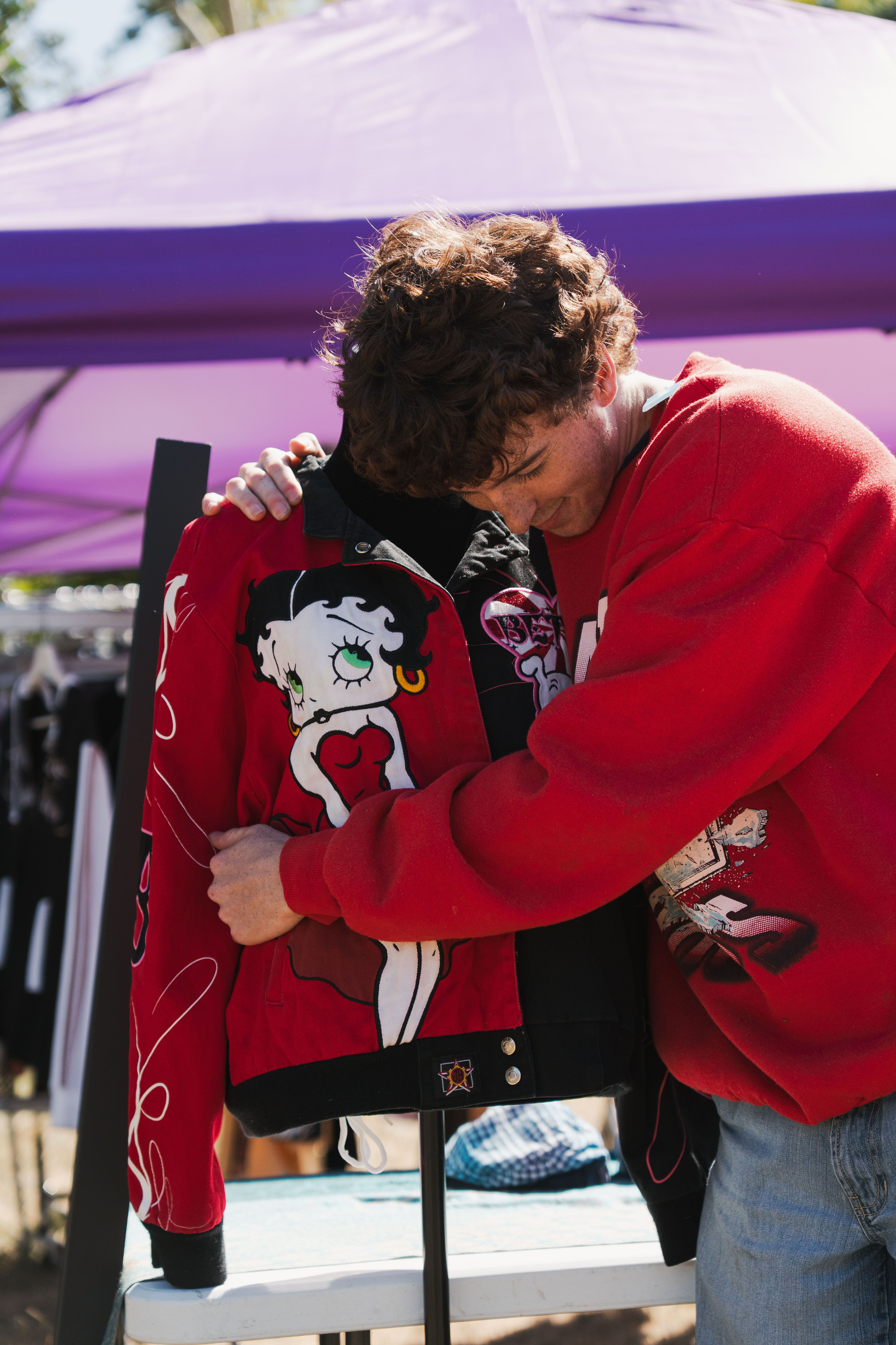 A person lying on snow-covered ground.